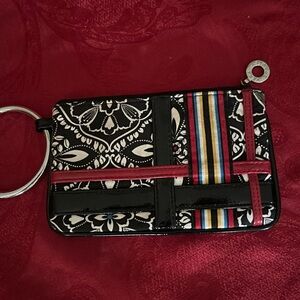 Vera Bradley milt colored clutch